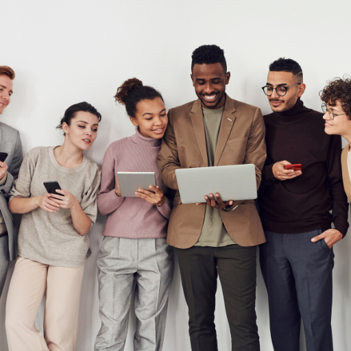 people looking at a laptop